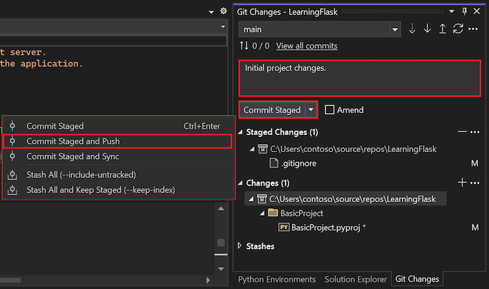 Screenshot that shows how to edit the commit message and commit and push the staged commits in the Git Changes window.